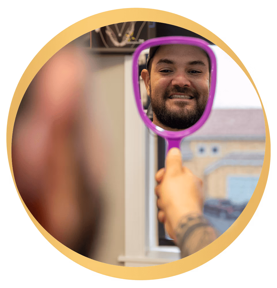 man looking into mirror